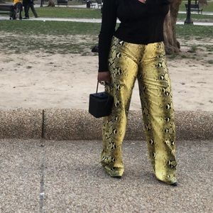 Faux leather snakeskin trousers